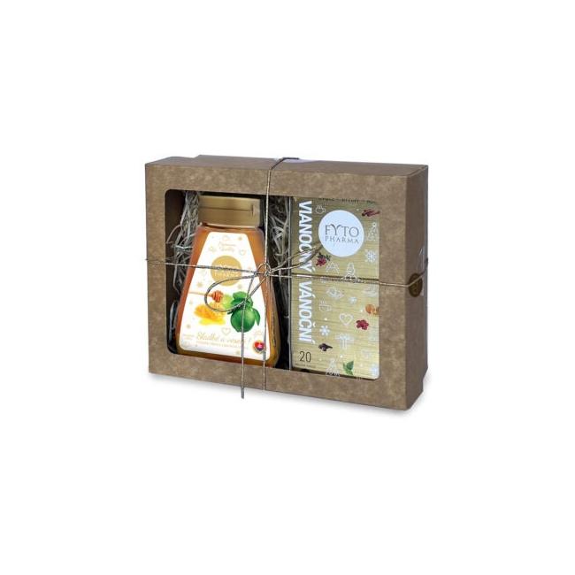 Geschenkbox mit Weihnachtstee und Honig mit Limette